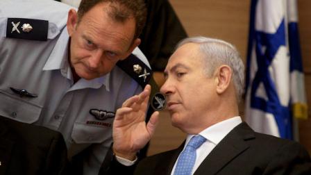 Israeli Prime Minister Benjamin Netanyahu, right, listens to his military advisor Maj. Gen. Yohanan Locker, as he attends a meeting of the Foreign Affairs and Defense Committee, in the Knesset, Israels parliament in Jerusalem, Monday, Aug. 1, 2011. (AP Photo/Sebastian Scheiner)