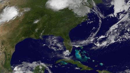 This image provided by NOAA-NASA GOES Project shows tropical storm Adrian taken at 5:15 a.m. EDT. Adrians maximum sustained winds increased to about 60 mph early Wednesday hours after it formed. Its expected to get stronger, but forecasts show it moving away from land in the next few days. No coastal watches or warnings have been issued. The center of the storm is about 345 miles south of Acapulco, Mexico. It is moving slowly in a west-northwest direction. That is expected to continue for the next couple of days. (AP Photo/NOAA-NASA GOES)