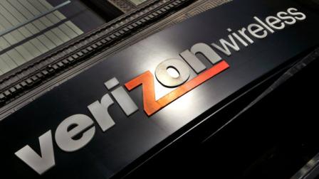 FILE-In this Oct. 30, 2006, file photo, a Verizon Wireless store sign is seen in a Portland, Ore. More than 35,000 unionized Verizon Communications workers from Massachusetts to Washington D.C. could go on strike after midnight Sunday, Aug. 7, 2011, if the two sides fail to reach an agreement on a new labor contract. (AP Photo/Don Ryan, File)