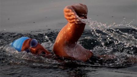 American endurance swimmer Diana Nyad , 61, swims in Cuban waters, offshore Havana, Cuba, Sunday, Aug. 7, 2011. Nyad jumped into Cuban waters Sunday evening and set off in a bid to become the first person to swim across the Florida Straits without the aid of a shark cage.