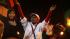 People celebrate the recent news of uprising in...