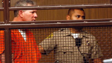 Former baseball player Lenny Dykstra, left, is led into a courtroom in San Fernando, Calif., Thursday, June 16, 2011. (AP Photo/Nick Ut)
