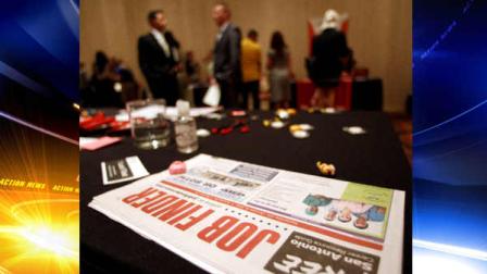 In this Oct. 4, 2011 photo, prospective employees and vendors attend a job fair, in San Antonio. Employers added 103,000 jobs in September, a modest burst of hiring after a sluggish summer.