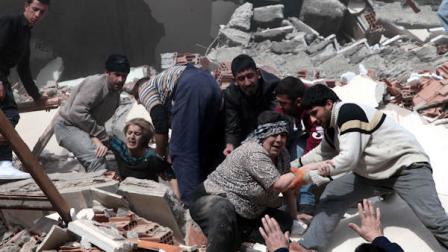 People rescue two women trapped under debris in Van eastsern Turkey after a powerful 7.2-magnitude earthquake struck eastern Turkey, collapsing about 45 buildings in Van province, Sunday, Oct. 23, 2011 according to the deputy Turkish prime minister. Only one death was immediately confirmed, but scientists estimated that up to 1,000 people could have been killed. The worst damage was caused to the town of Ercis, in the mountainous eastern province of Van, close to the Iranian border. ( AP Photo/Ali Ihsan Ozturk, Anatolia)