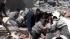 People rescue two women trapped under debris in...