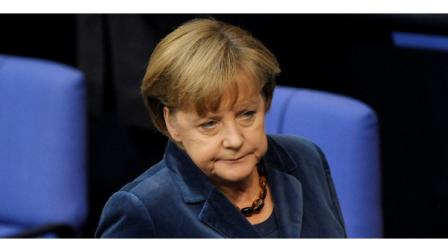 German Chancellor Angela Merkel reacts during a debate at the German federal parliament, Bundestag, in Berlin, Germany, Wednesday, Oct. 26, 2011. Merkel is calling for the private sector to make a significantly larger contribution than previously agreed to reduce Greeces debt burden. Merkel said the aim of a European summit Wednesday must be a solution that allows for Greece to cut its debt load to 120 percent of gross domestic product by 2020. (AP Photo/dapd/Michael Gottschalk)