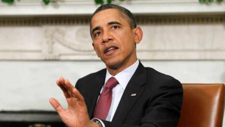 President Barack Obama answers a reporters question about the European debt deal as he meets with Czech Prime Minister Petr Necas, not shown, Thursday, Oct. 27, 2011, in the Oval Office of the White House in Washington.