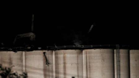 Smoke leaks from the top of the Bartlett Grain Co. elevator in Atchison, Kan., Saturday, Oct. 29, 2011. An explosion at the grain elevator injured at least two people.