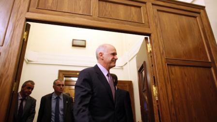 Greeces Prime Minister George Papandreou exits after a cabinet meeting at the parliament in Athens on Sunday, Nov. 6 2011. Greek leaders struggled for a second day to end an ongoing political crisis, under intense pressure to ensure the country doesnt go bankrupt in the next few weeks and that it remains in the eurozone. Papandreou informed cabinet members that he asked Greek President Karolos Papoulias for an urgent meeting with opposition leader Antonis Samaras. (AP Photo/Kostas Tsironis)