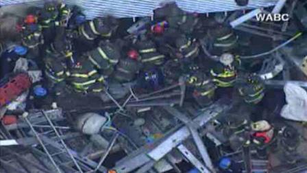 Rescue crews worked to pull injured workers out of the rubble of a New York City construction collapse.