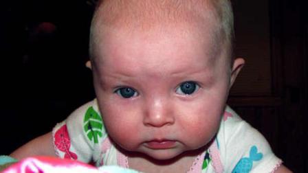 This photo provided Oct. 4, 2011, by the Kansas City, Mo., Police Department, shows Lisa Irwin. Kansas City police have issued an Amber Alert for the 10-month-old girl who apparently was abducted from her bedroom overnight. Lisa has blue eyes and blond hair. She is 30 inches tall and weighs between 26 and 30 pounds.