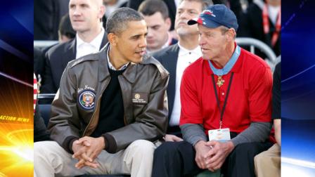 President Barack Obama talks with Medal of Honor recipient John Baca before the start of the Carrier Classic NCAA basketball game between North Carolina and Michigan State on the flight deck of the USS Carl Vinson in Coronado, Calif., Friday, Nov. 11, 2011. (AP Photo/Susan Walsh)