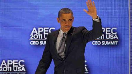 U.S. President Barack Obama waves to the audience before participating in a discussion at the APEC CEO Summit, a gathering of business leaders at the Asia-Pacific Economic Cooperation summit Saturday, Nov. 12, 2011, in Honolulu. (AP Photo/Andres Leighton)