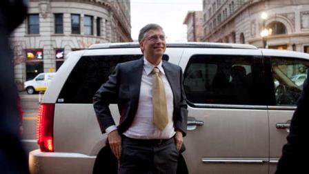 Microsoft founder Bill Gates arrives at the Frank E. Moss federal courthouse in Salt Lake City, Monday, Nov. 21, 2011. Gates was scheduled to testify in a one billion dollar antitrust lawsuit brought by Novell Inc. Gates, wearing a gray suit and a yellow tie, was the first witness to testify as Microsoft lawyers presented their case in the trial thats been ongoing in federal court in Salt Lake City for about a month.