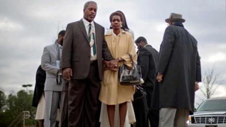 Robert Champion Sr., left, and his wife, Pam wait to lead a procession into the funeral service for their son, Florida A&M University band member Robert Champion, Wednesday, Nov. 30, 2011 in Decatur, Ga. The 26-year-old was found dead on Nov. 19 on a bus parked outside an Orlando, Fla. hotel after the schools football team lost to a rival. Authorities suspect hazing but have not released any further details.