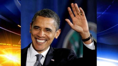 President Obama waves to the crowd at Osawatomie High School in Osawatomie, Kansas, Tuesday, Dec. 6, 2011, where he delivered a major speech on the economy.