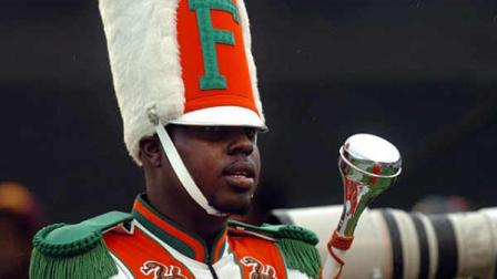 Robert Champion, a drum major in Florida A&M Universitys Marching 100 band, performs during halftime of a football game in Orlando, Fla. (Joseph Brown III/The Tampa Tribune/AP Photo)
