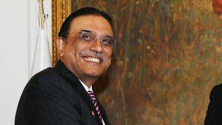 Pakistani president Asif Ali Zardari poses for cameras before a meeting in Istanbul, Turkey, Tuesday, Nov. 1, 2011.