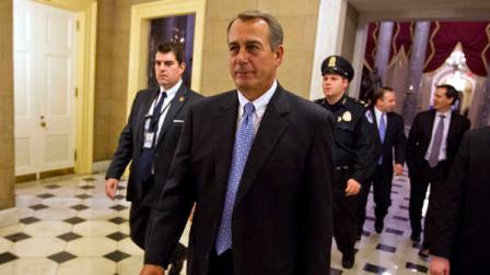House Speaker John Boehner of Ohio walks of the floor of the House chamber on Tuesday, Dec. 20, 2011, in Washington. The House rejected legislation to extend a payroll tax cut and jobless benefits for two months, drawing a swift rebuke from President Barack Obama that Republicans were threatening higher taxes on 160 million workers on Jan. 1.