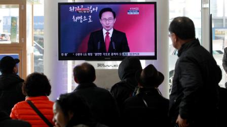 People watch a TV screen reporting South Korean President Lee Myung-bak delivers New Years speech to the nation, at the Seoul Train Station in Seoul, South Korea, Monday, Jan. 2, 2012. South Koreas president opened the door Monday to possible nuclear talks with North Korea and warned the neighboring country to avoid any provocations, saying the Korean peninsula is at a crucial turning point.