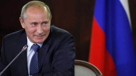 Russian Prime Minister Vladimir Putin speaks at a meeting with activists of the Popular Front in Moscow, Russia, Wednesday, Sept. 21, 2011.