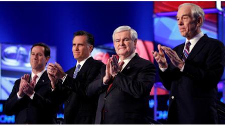 Republican presidential candidates, former Pennsylvania Sen. Rick Santorum, former Massachusetts Gov. Mitt Romney, former House Speaker Newt Gingrich and Rep. Ron Paul, R-Texas, take the stage before the start of the Republican presidential candidate debate at the North Charleston Coliseum in Charleston, S.C., Thursday, Jan. 19, 2012. (AP Photo/Matt Rourke)