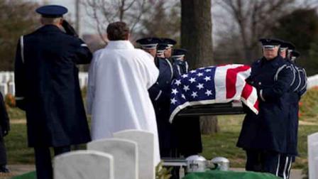 An Air Force honor guard carries the casket of former Tuskegee airman, retired Lt. Col. Luke Weathers during burial services at Arlington National Cemetery i Arlington, Va., Friday, Jan. 20, 2012. (AP Photo/Evan Vucci)