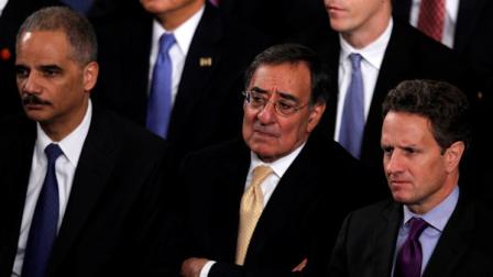 Cabinet members, from left, Attorney General Eric Holder, Defense Secretary Leon Panetta, Treasury Secretary Timothy Geithner listen to President Barack Obamas the State of the Union address on Capitol Hill in Washington, Tuesday, Jan. 24, 2012. (AP Photo/Evan Vucci)