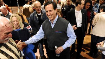 Republican presidential candidate former Pennsylvania Sen. Rick Santorum greets supporters at the First National Bank Exhibition Hall in Loveland, Colo., Saturday, Feb. 4, 2012. (AP Photo/Chris Schneider)