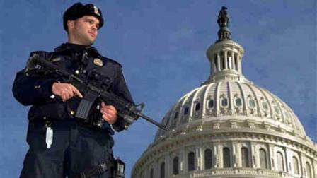 Capitol Police officer Angel Morales, stands on guard on the West side of the Capitol in Washington Friday, Feb. 17, 2012. A 29-year-old Moroccan man was arrested Friday in an FBI sting operation near the U.S. Capitol while planning to detonate what police say he thought were live explosives.