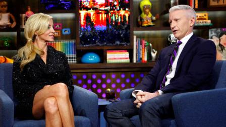 COMMERCIAL IMAGE - In this photograph taken by AP Images for Bravo, reality star Camille Grammer and TV personality Anderson Cooper appear on Bravos Watch What Happens Live show on Monday, Jan. 9, 2012, in New York. (Peter Kramer/AP Images for Bravo