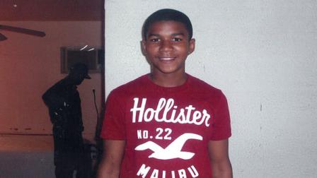 FILE - In this undated file family photo, Trayvon Martin poses for a family photo. College students around Florida rallied Monday, March 19, 2012, to demand the arrest of a white neighborhood watch captain who shot unarmed teen Martin last month, though authorities may be hamstrung by a state law that allows people to defend themselves with deadly force.