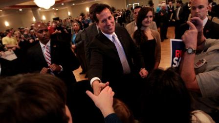 Republican presidential candidate, former Pennsylvania Sen. Rick Santorum, center, shakes hands with supporters during a campaign rally in Bellevue, Wis., Saturday, March 24, 2012. (AP Photo/Jae C. Hong)
