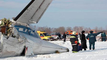 In this photo provided by Russia Emergency Situations Ministry press service, Russian emergency workers search the crash site of the ATR-72 plane crash outside Tyumen, a major regional center in Siberia, Russia, Monday, April 2, 2012. The passenger plane crashed shortly after take-off on Monday morning, killing 31 and leaving 12 survivors hospitalised in serious condition, Russian emergency officials. The French-Italian-made twin-engine turboprop ATR-72 plane was operated by UTair, flying from Tyumen to the oil town of Surgut with 39 passengers and four crew.
