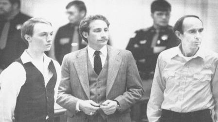 FILE - This Dec. 18, 1984 file photo shows Don Nichols, right, standing with his son, Dan Nichols, left, as they pled not guilty in court in Virginia City, Mont. Standing with them is attorney, Steve Ungar. The U.S. attorneys office in Montana has filed federal drug and weapons charges against Dan Nichols, part of the father and-son duo convicted in kidnapping a world class athlete in 1984, killing a would-be rescuer and eluding authorities for months, April 19, 2012.