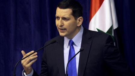Syrias foreign ministry spokesman Jihad Makdissi speaks at a news conference in Damascus, Syria, Sunday, May 27, 2012. (AP Photo/Bassem Tellawi)