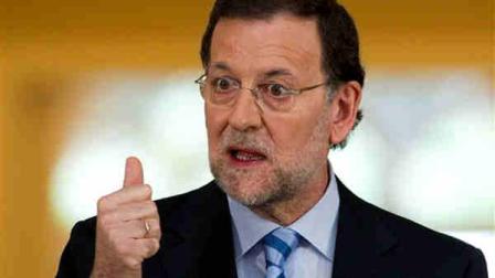 Spains Prime Minister Mariano Rajoy speaks during a press conference at the Moncloa Palace, in Madrid, Sunday, June 10, 2012. Spain became the fourth and largest country to ask Europe to rescue its failing banks, a bailout of up to 100 billion euros ($125 billion) that leaders hoped would stabilize a financial crisis that threatens to break apart the 17-country eurozone. (AP Photo/Daniel Ochoa de Olza)