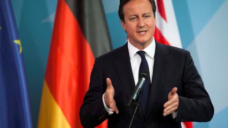 Prime Minister David Cameron briefs the media prior to a bilateral meeting with German Chancellor Angela Merkel at the chancellery in Berlin, Germany, Thursday, June 7, 2012. (AP Photo/Markus Schreiber)