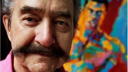 ** FILE ** This file photo from Aug. 31, 2007 shows artist LeRoy Neiman, perhaps the most popular living American artist,as he poses in his studio in New York. Neiman has donated $1 million to create a permanent home for a Harlem community arts center. Neiman, who is best known for his colorful and energetic paintings of sporting events, plans to attend the ribbon cutting for the Arts Horizons LeRoy Neiman Art Center Tuesday June 17, 2008. (AP Photo/Bebeto Matthews,File)