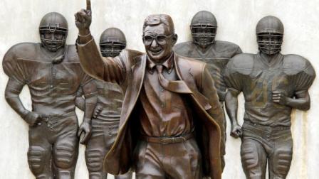 This is the statue of former Penn State University head football coach Joe Paterno that stands outside Beaver Stadium in State College, Pa., Friday, July 13, 2012. (AP Photo/Gene J. Puskar)
