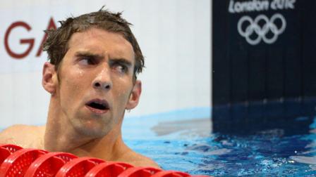 United States Michael Phelps reacts after placing fourth in the mens 400-meter individual medley swimming final at the Aquatics Centre in the Olympic Park during the 2012 Summer Olympics in London, Saturday, July 28, 2012. (AP Photo/Mark J. Terrill)