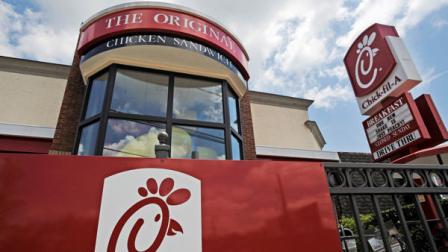 FILE - This Thursday, July 19, 2012 photo shows a Chick-fil-A fast food restaurant in Atlanta. Chick-fil-A, whose founder distinguished the fast-food chain by closing on Sunday out of religious piety, continues to mix theology with business and finds itself on the front lines of the nations culture wars after its president, Dan Cathy, confirmed his opposition to gay marriage in June 2012. (AP Photo/Mike Stewart)