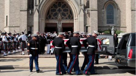 A Marine honor guard carries the casket of Lance Cpl. Greg Buckley Jr. out of St. Agnes Cathedral after his funeral Mass, Saturday, Aug. 18, 2012 in Rockville Center, N.Y.. Buckley Jr. was barely 21 years old when he was killed in an attack by a policeman in Afghanistan. (AP Photo/Mary Altaffer)