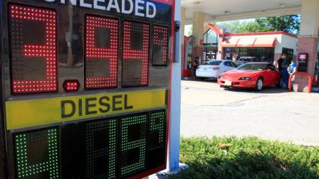 A man fills his gas tank at a gas station Wednesday, Aug. 29, 2012, in South Euclid, Ohio. Drivers are facing the biggest one-day jump in gasoline prices in 18 months as Hurricane Isaac swamps the nations oil and gas hub along the Gulf Coast. Some states in the Midwest suffered even more dramatic spikes. Ohio prices jumped 14 cents, Indiana prices jumped 13 cents and Illinois prices jumped 10 cents according to the Oil Price Information Service. (AP Photo/Tony Dejak)