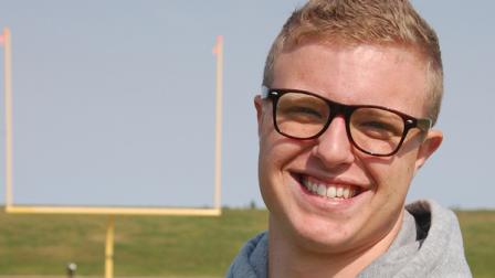 Jamie Kuntz poses for a photograph at a football field in Dickinson, N.D., on Tuesday, Sept. 11, 2012. Kuntz says he was kicked of the North Dakota State College of Science football team for being gay. School officials say he was dismissed from the team for lying to a coach. (AP Photo/James MacPherson)