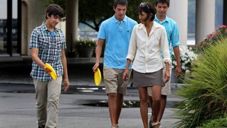 Brett Pogostin, 16, of Scarsdale, N.Y., left, shows a Frisbee to June Winward of Scasdale in honor of Tyler Madoff, 15, as they leave a memorial service in New Rochelle, N.Y. on Thursday, July 26, 2012. At center is Josh Winward, 15, and his brother Sam Winward, 15, right, both of Scarsdale, who along with Pogostin were members of the same Ultimate Frisbee team with Madoff. The teen from White Plains, N.Y., was hiking on July 4, 2012 during a kayak expedition. He was lost while resting at a tidal pool with huge waves. (AP Photo/Craig Ruttle)