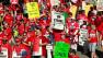 Striking Chicago school teachers march after a rally Saturday, Sept. 15, 2012 in Chicago. Thousands of striking Chicago public school teachers and their allies packed a city park Saturday in a boisterous show of force as union leaders and the district tried to work out the details of an agreement that could end a week-long walkout.(AP Photo/Sitthixay Ditthavong)