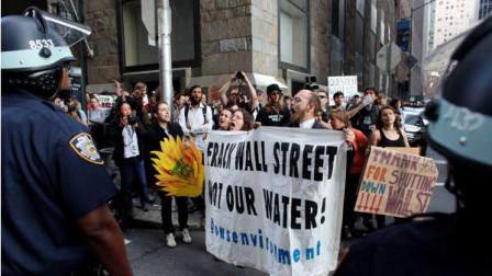 Protestors and police face off during an Occupy Wall Street march, Monday, Sept. 17, 2012, in New York. (AP Photo/Jason DeCrow)
