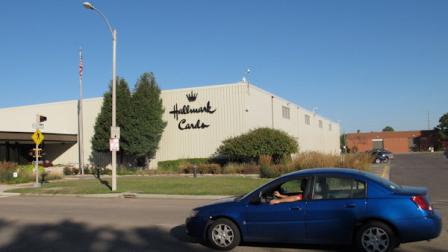 A car moves past the Hallmark Cards Inc. plant in Topeka, Kan., Tuesday, Oct. 2, 2012. The company says it plans to close the plant by the end of 2013. (AP Photo/John Hanna)