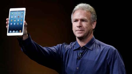 Phil Schiller, Apples senior vice president of worldwide product marketing, introduces the iPad Mini in San Jose, Calif., Tuesday, Oct. 23, 2012. (AP Photo/Marcio Jose Sanchez)